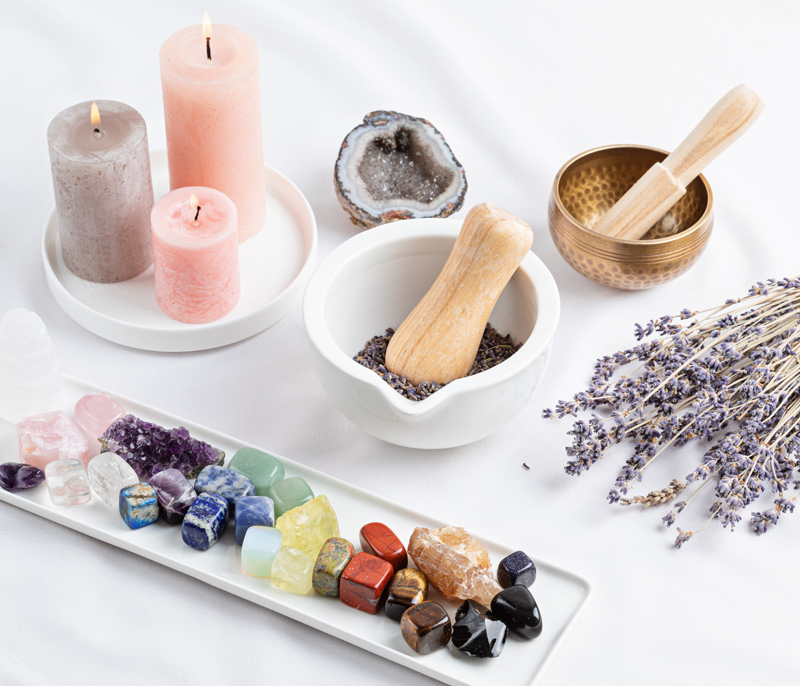 An array of gemstones and candles.